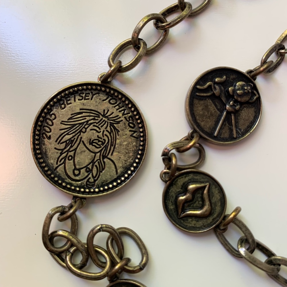Vintage Betsey Johnson long coin necklace 44” long in a oiled bronze finish.